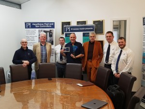 Pi’s Board of Directors with a 20th Anniversary Gift from Chemtrac